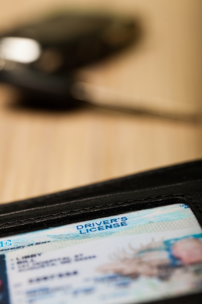 A close-up of a Social Security card, with a focus on the name and Social Security number. Soft lighting, emphasis on the official nature of the document.