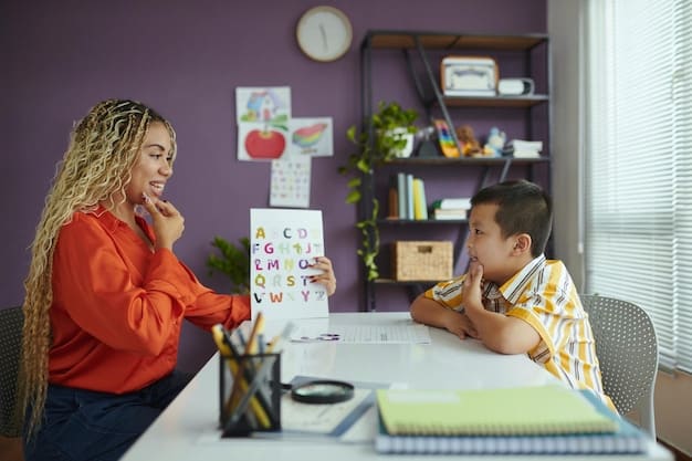 A teacher providing one-on-one support to a young student at their desk. The teacher is smiling and engaged, creating a supportive and encouraging learning environment. The classroom is well-equipped with educational materials.