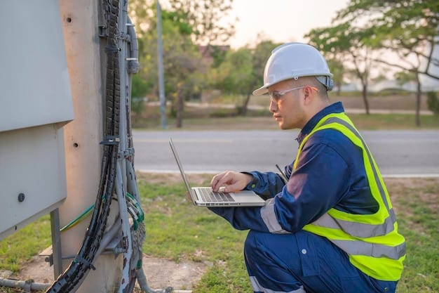 A technician installing fiber optic cables in a rural area, symbolizing the expansion of broadband internet access driven by infrastructure investments.