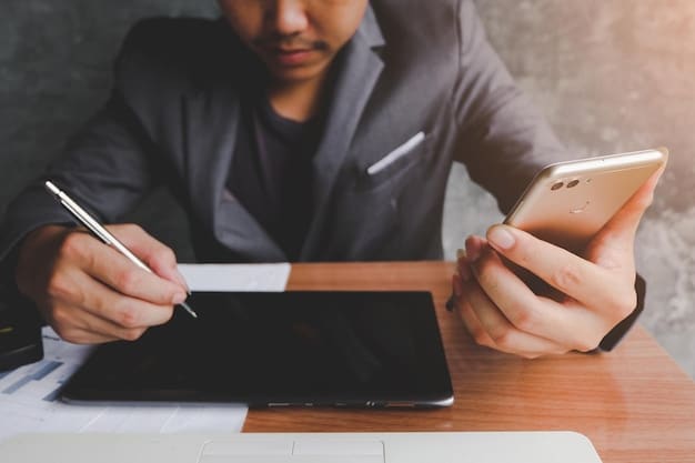 An individual filling out an online form on a tablet, with a pen in hand, focused on submitting their claim for unclaimed government money.